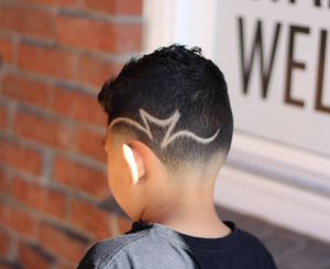 Custom design haircut on a kid.